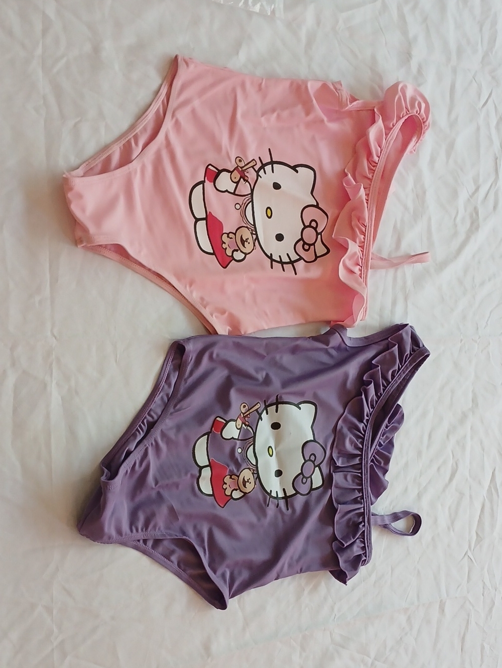 Hello Kitty Pink and Purple Ruffle One-Piece Bodysuits